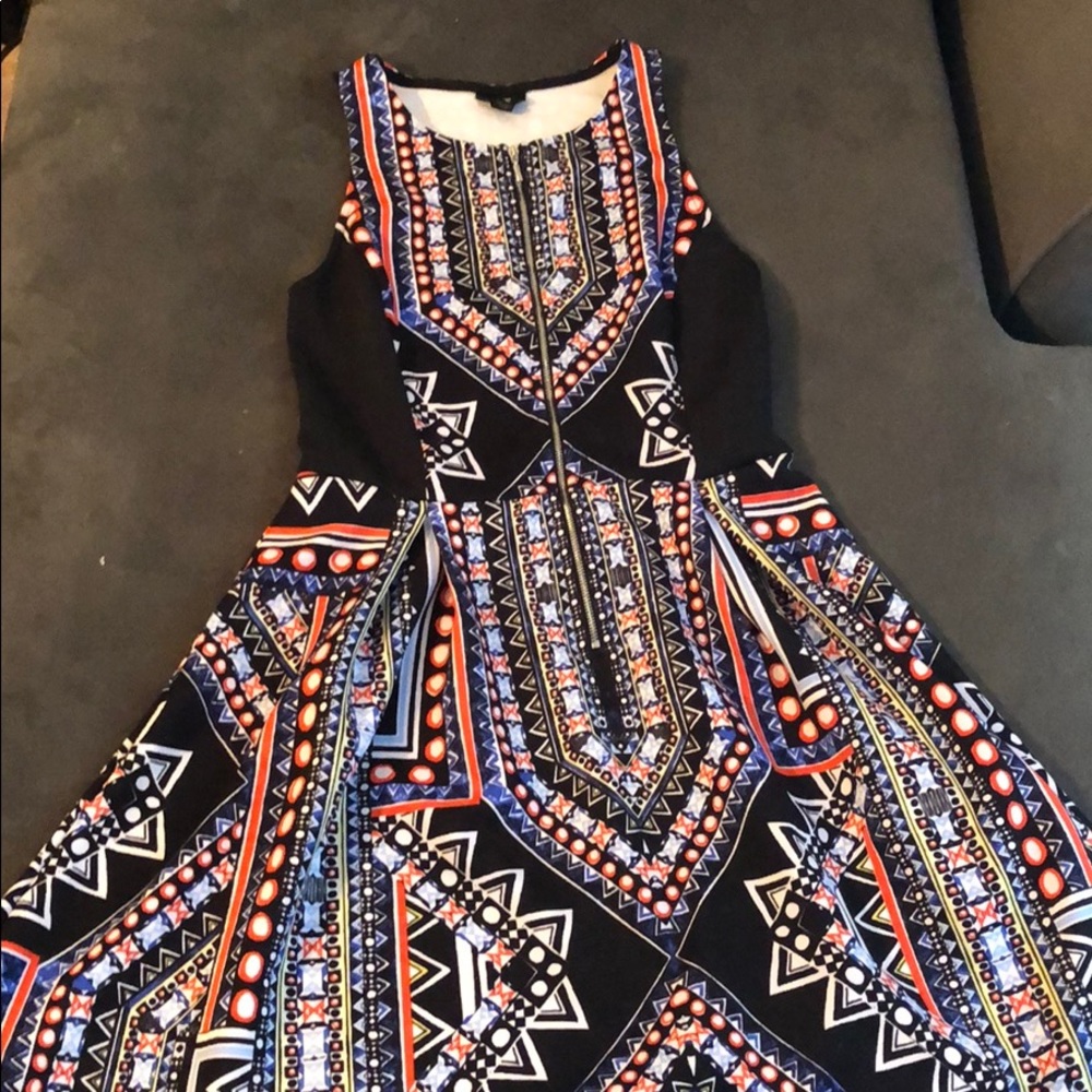 Zip front sleeveless knee length dress